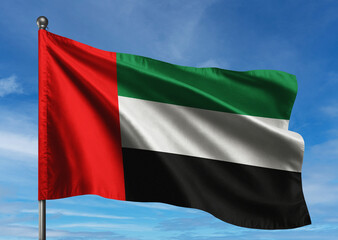 United Arab Emirates flag waving proudly in a bright blue sky, showcasing detailed fabric texture, smooth motion, and realistic lighting symbolizing national pride and unity.