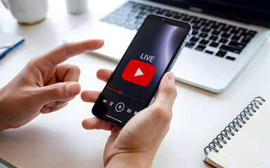Person watching live video on smartphone, representing social media streaming, video marketing, online communication, and digital content engagement