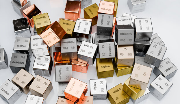 The 17 rare earth elements depicted as cubes on a heap with their atomic numbers, symbol and names engraved. Scandium Yttrium Neodym Lanthan Terbium Lutetium Holmium Praseodym Thulium Ytterbium Erbium