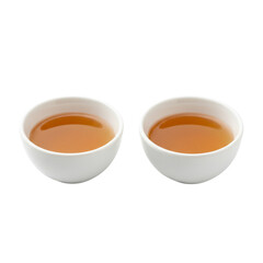 Two bowls of soothing herbal tea, a warm and inviting beverage to promote relaxation and wellness, perfect for health blogs and mindful living content