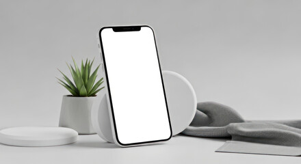 Modern smartphone mockup displaying blank screen with plant and fabric detail