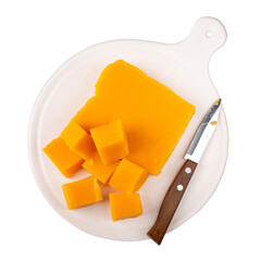 Pumpkin marmalade. Homemade pumpkin jelly candies on white plate  isolated on white background. Top view.