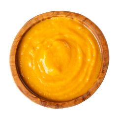 Pumpkin soup  puree,  cream soup in wooden bowl isolated on white background. Top view.