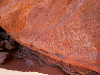 Rock paintings of the Tadrart Rouge in the Sahara Desert. Prehistoric art on sandstone walls with high archaeological and cultural value.