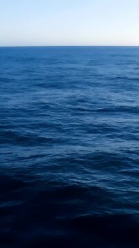 Wide Angle Dark Ocean and Clear Sky Loop