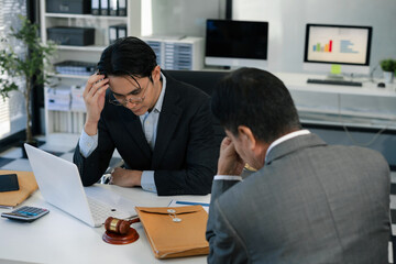 Fototapeta premium Lawyer comforts his clients with legal advice and serious stress trust commitment for justice issues and lawyer concepts.