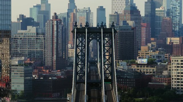 Aerial view of the Manhattan Bridge in New York City, showcasing the iconic skyline and architectural marvels
