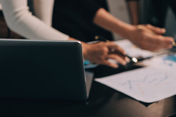 Fototapeta premium Accounting company provide finance and taxation planning for profitable cash flow, Auditor and accountant team working in office, analyze financial data and accounting record with calculator.Insight