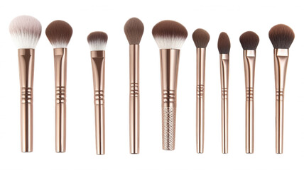A set of makeup brushes with gold handles on black background