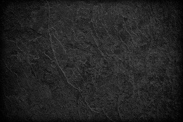 Dark grey black slate background or texture.