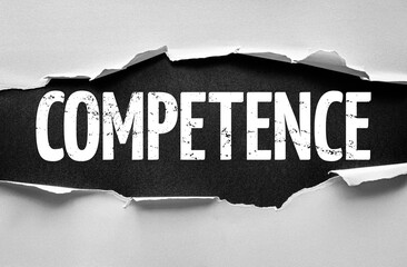 Torn paper effect revealing the bold word COMPETENCE in distressed white capital letters on a dark textured background, symbolizing skill, ability, and proficiency in a striking visual style