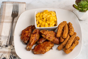 chicken wings and drumsticks with chicken fries