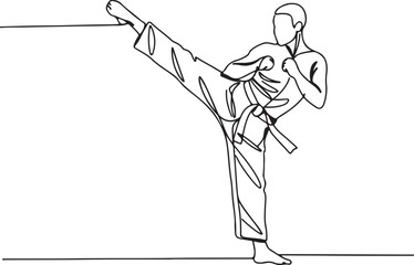 Man in martial arts uniform performing a high kick