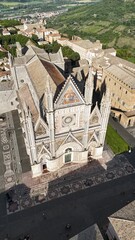 Aerial drone footage of Orvieto, Umbria, showcasing the medieval hilltop city, iconic cathedral, and stunning surrounding countryside