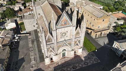 Aerial drone footage of Orvieto, Umbria, showcasing the medieval hilltop city, iconic cathedral, and stunning surrounding countryside