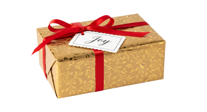Gift box is wrapped in gold floral paper with red ribbon and 'Joy' tag, presenting a festive appearance.