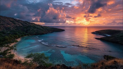 Fototapeta premium Dawn Illuminates the Iconic Snorkeling Jewel of Hanauma Bay in Oahu, Hawaii with Vibrant Blues of Sky and Sea
