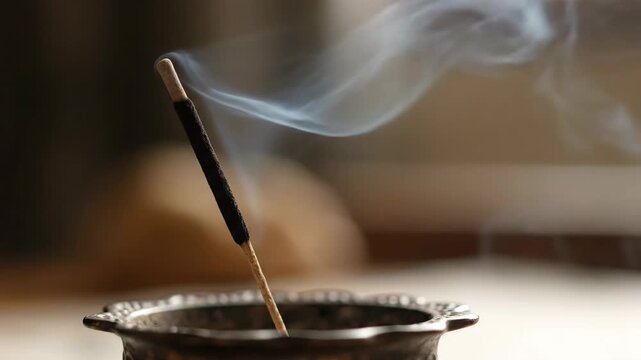 Spiritual Aromatherapy with a Burning Joss Stick and Smoke.