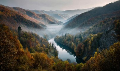 Serene Autumn Landscape with Misty River in Mountain Valley