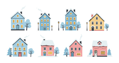 Charming winter village scene with festive houses and snowy roofs