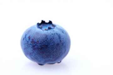 Single Ripe Berry with Dew on Skin in Minimalist Composition