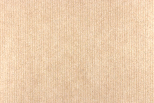 Decorative striped paper texture. Onion fibers decorated paper background. Kraft stripes paper pattern. Landscape horizontal orientation.