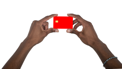 Hand holding red bank card in closeup view. Black skin male making electronic payment gesture for