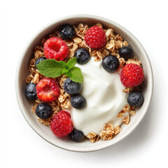 Granola bowl with yogurt, fresh berries, and mint leaf