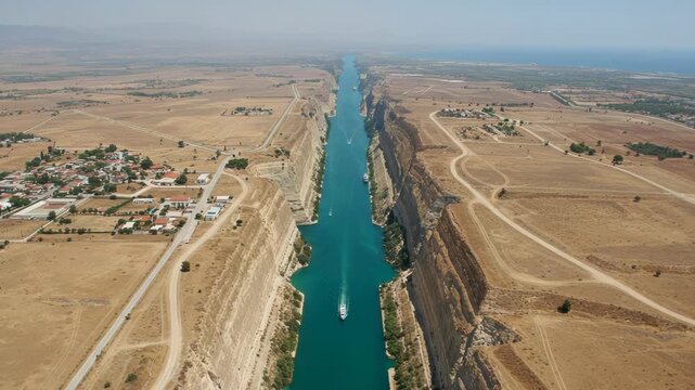 Aerial view of the corinth canal in greece with a ship navigating its waters
