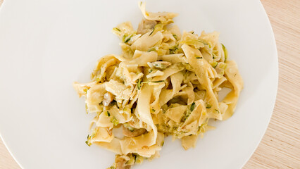 Scrumptious medley of rustic pasta ribbons infused with zucchini whispers, perfect for impromptu...