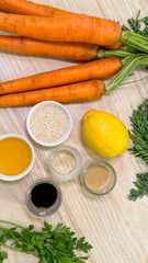 Vibrant carrots and zesty lemon meet sesame seeds and spices, perfect for Veganuary or National Salad Month creativity