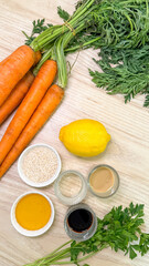 Vibrant carrots and zesty lemon dance in a rustic culinary landscape, perfect for Shrove Tuesday's veggie feast or Persian Nowruz