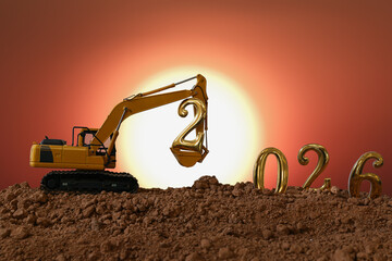 Concept happy new year 2026,crawler excavator  with lift up bucket the number two .On red the sun backgrounds