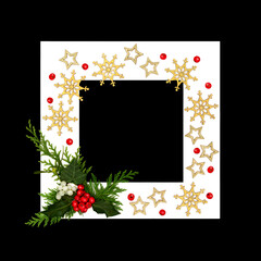 Christmas gold snowflake decorations, winter traditional flora, holly, berries, mistletoe flora on black background white frame. Abstract nature festive design.