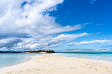 Tropical beach with blue sky in Nosy Iranja