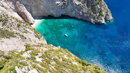 Aerial drone photo of famous steep rocky white cliffs creating beautiful coves and turquiose sea...