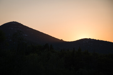 Silhouette of Scah hill on the Ugljan island at sunset, Croatia