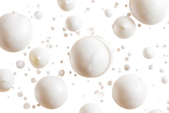 Creamy, round, white blobs on black