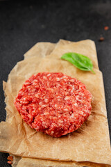Raw cutlet meat burger ground meat beef, pork fresh natural product tasty snack delicious gourmet food background on the table rustic top view copy space