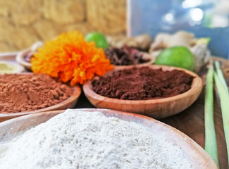 Nature spa spices placed on the wooden plates in close up