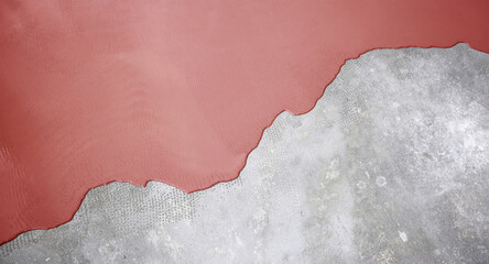 The concrete floor is light red painted. Contractor will paint garage floor to accelerate home sale