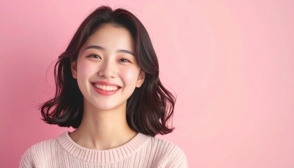 Fototapeta premium Smiling young woman portrait in a pink background lifestyle photography cheerful mood studio environment front view positive vibes