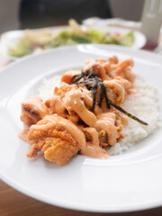 A plate of homemade Japanese Chicken Karaage served with Mentai sauce and white rice