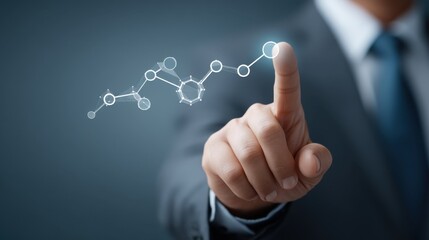 Business professional using finger to interact with futuristic digital interface displaying molecular structures and data analytics in a modern setting
