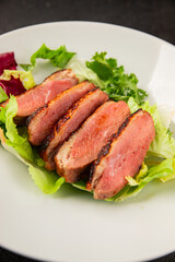 Duck breast roast poultry fresh natural product tasty snack delicious gourmet food background on the table rustic top view copy space