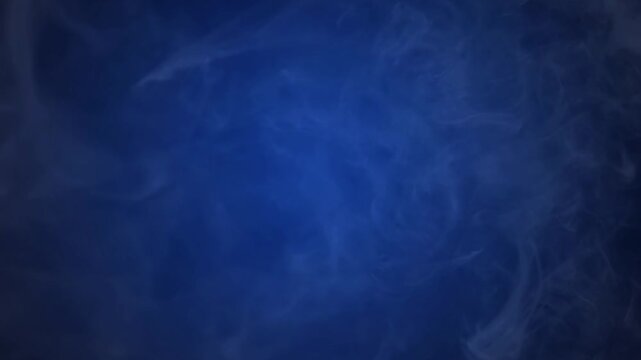 Smoke effect video on dark blue background with soft swirling motion high quality videos and video footage for visual effects and cinematic scenes