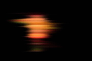 Dark minimal abstract art featuring golden orange glowing blur streaks creating motion and digital energy aesthetic, perfect for tech and futuristic visuals.