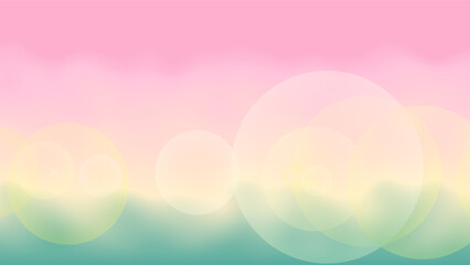 ピンク、イエロー、グリーンのグラデーションの背景に、ぼんやりとした丸い模様。