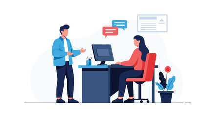 Two colleagues discussing work at a computer in the office.