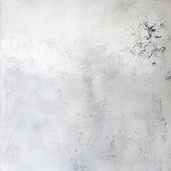 An abstract textured background shows a white stucco surface with mottled gray stains and some rough patches.